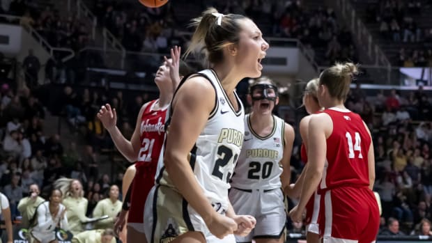 Purdue senior Abbey Ellis celebrates scoring while getting fouled against Nebraska at Mackey Arena on Saturday, Feb. 17, 2024.